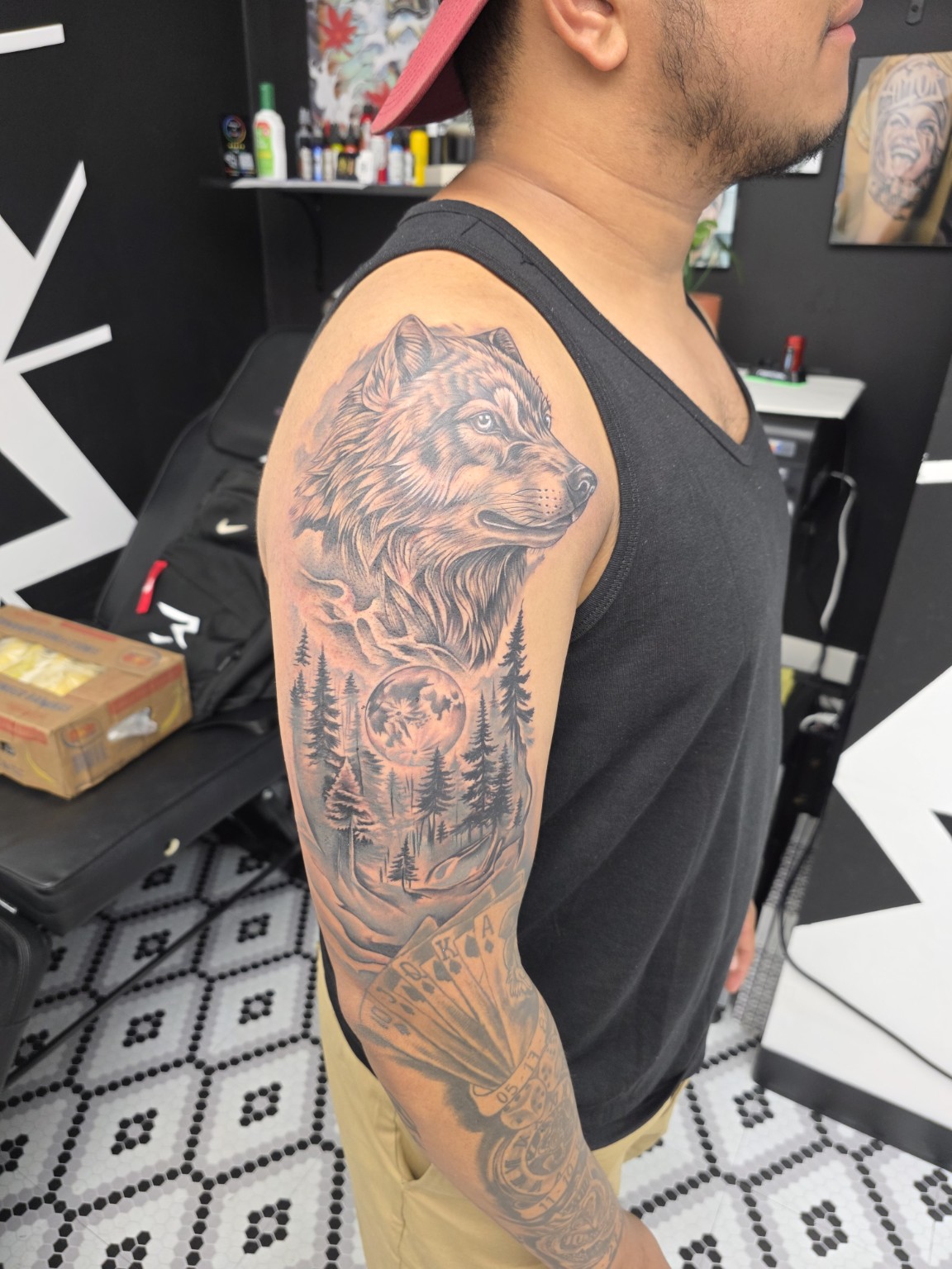 Wolf and forest tattoo by Adriano